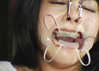 Japanese chick forcibly swallows eels