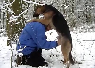 Wintertime outdoors bestiality sex