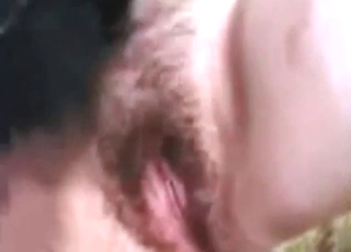 Badass black-haired lady fucks a dog pretty hard