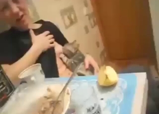 Zoo sex shows a sexy girl using her tits for a cat