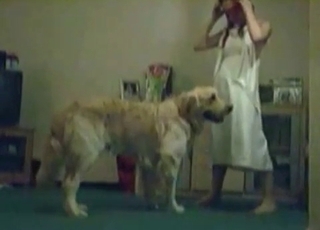 This whore wears white clothes and goes for a dog cock