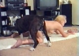 Amazingly hot older woman is fucking with an animal