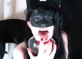 This dirty bi-atch is swallowing her doggy cum