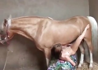 Bony chick letting a horse nail her